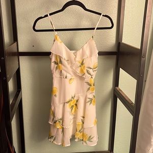 Cute, short summer dress with lemon detail
